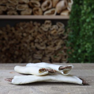 Visa detaljer för RAUH Belly Toast stor - tuggben nöt & vom Tuggben av nöt med wom-fyllning från Rauh.